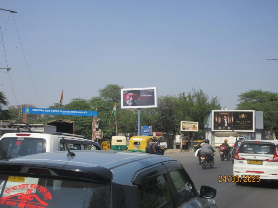Unipole Advertising in MG Road Andheria More Crossing